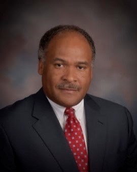 Member  Dr. Freddie  Williamson 
