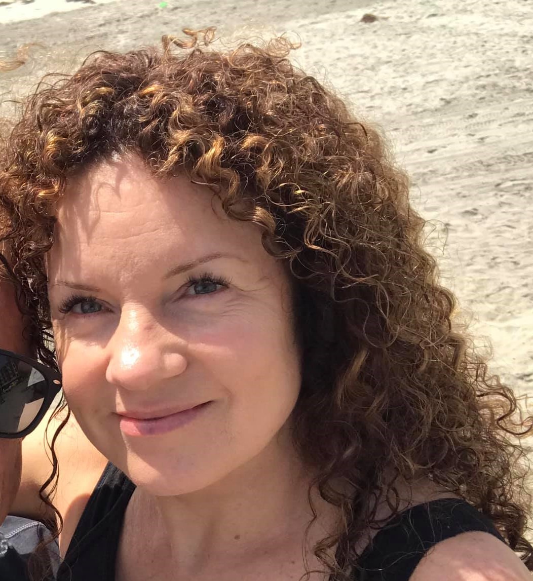 Member  Mrs. Trisha Dellis