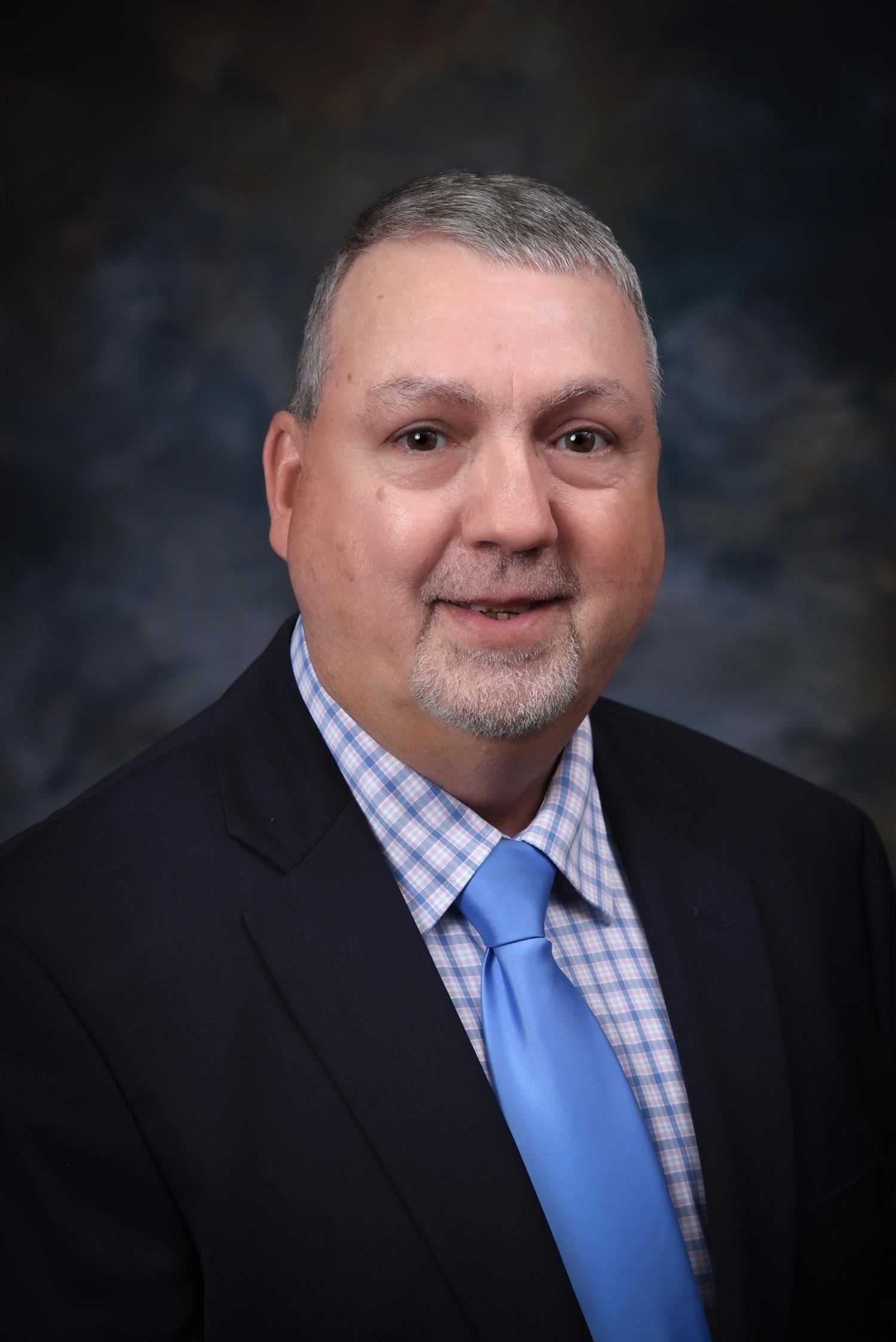 Member  Mr. Mark  Rains 