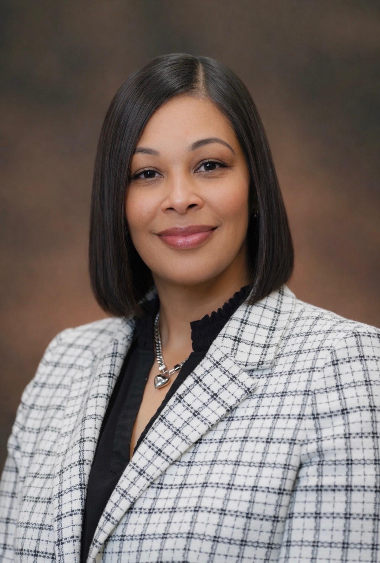 Member  Dr.  Shontier  Barnes 