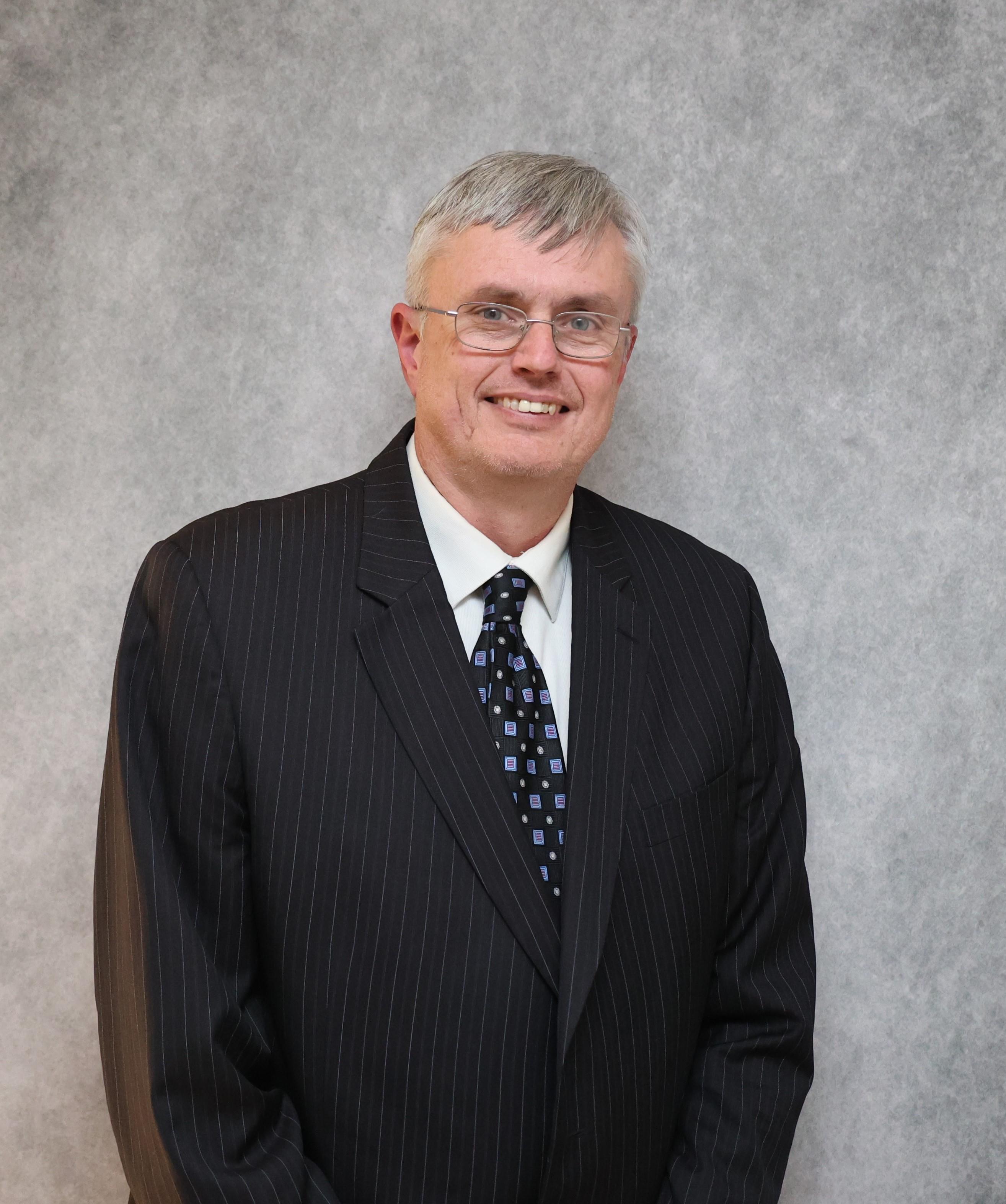 Member  Mr. Britt Madden