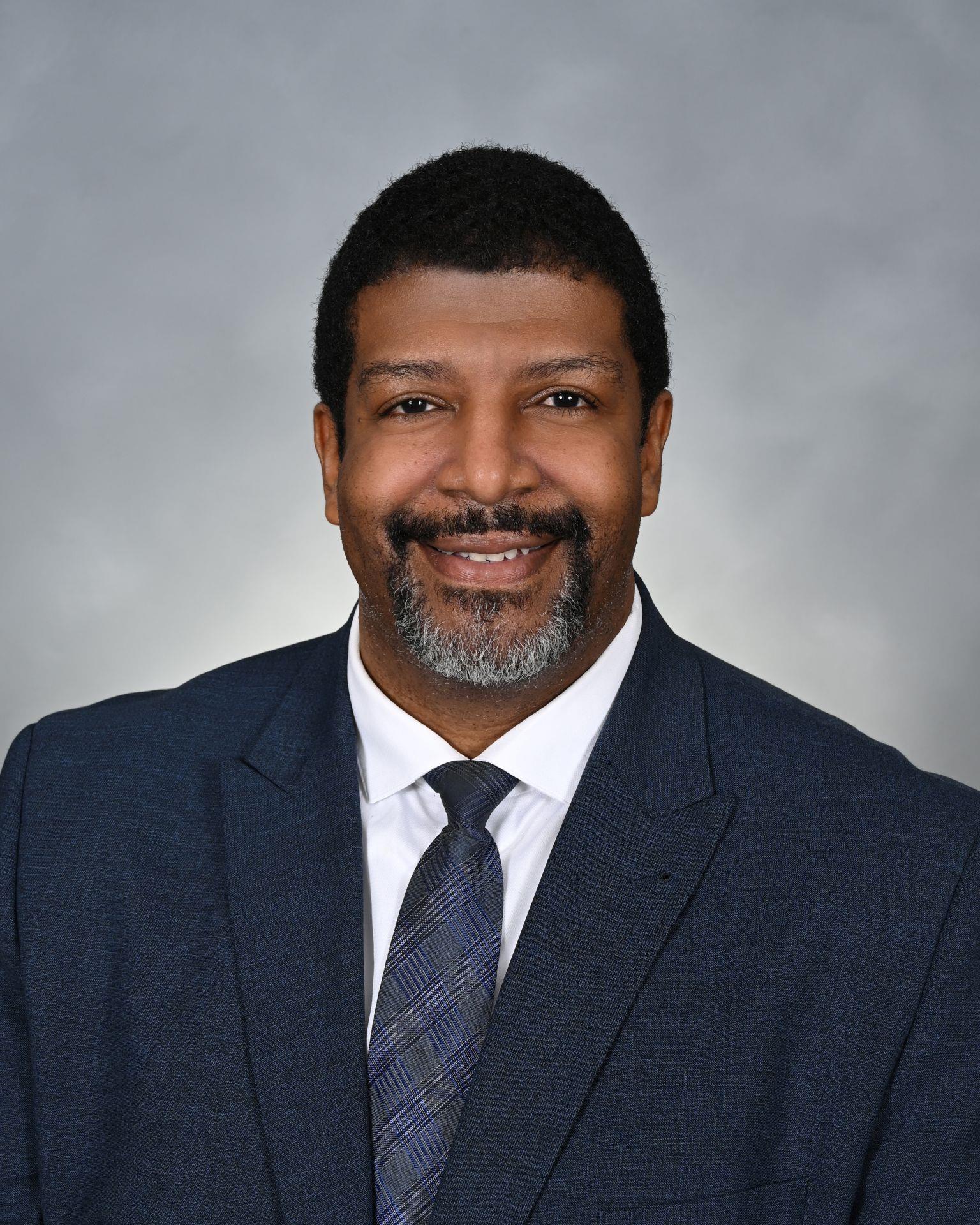 Member  Dr. Derald Davis