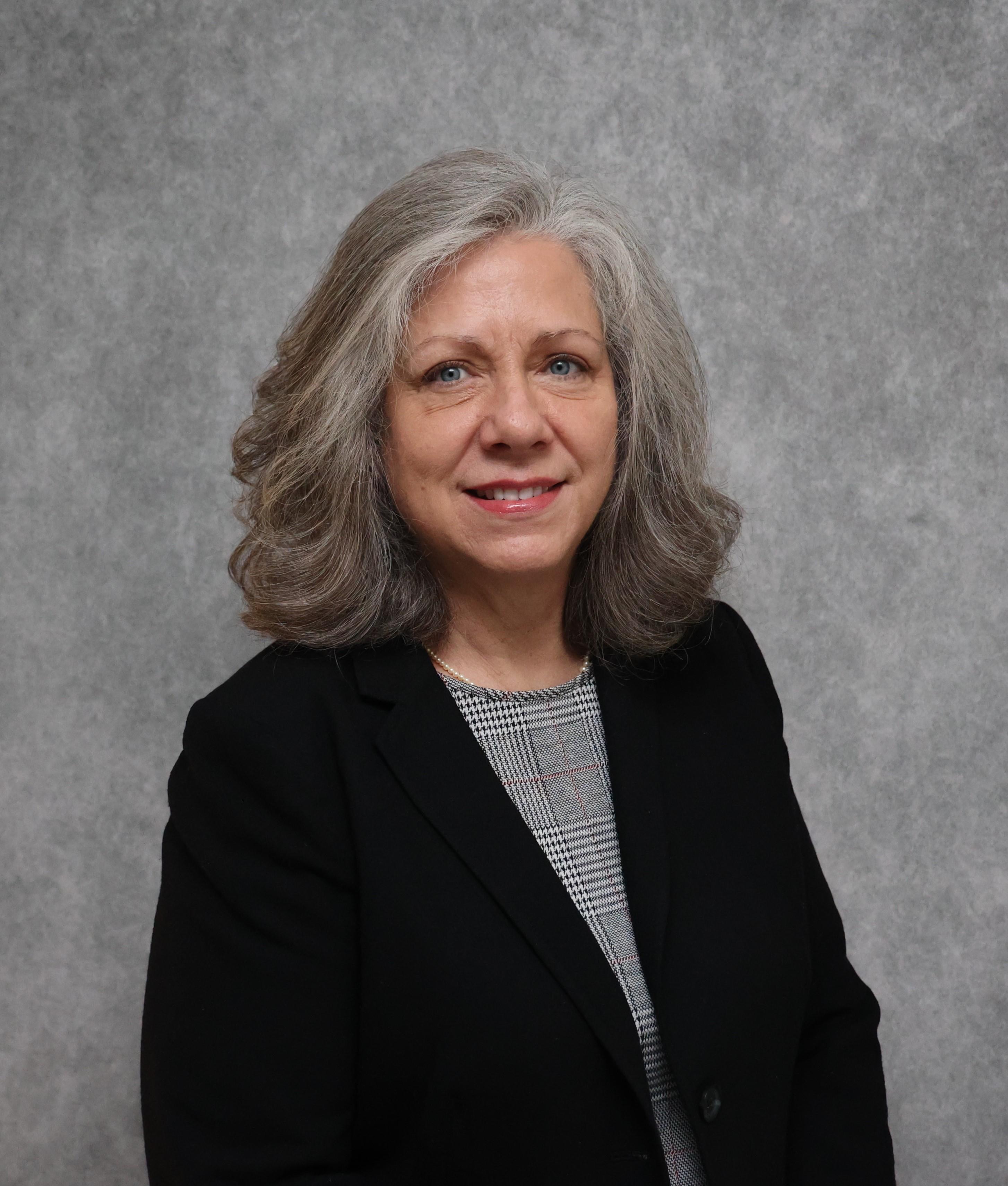 Member  Dr. Rita Carter