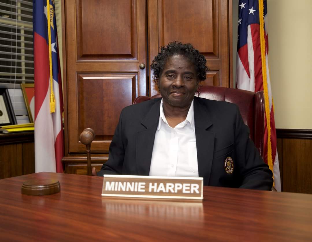Member  Ms. Minnie Lee Harper