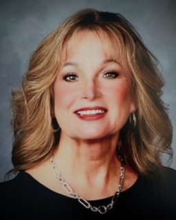 Member  Dr. Denise B. Warnock 